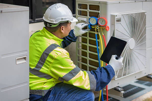 Professional Heat Pump Repair technician working in Flowood, MS